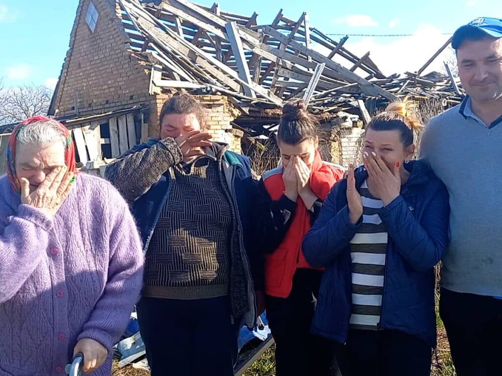 A family learns it will receive a modular home